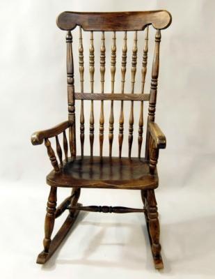 A late 19th ash and elm spindle back West Country style rocking chair