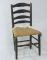 A 19thC elm ladderback country chair.