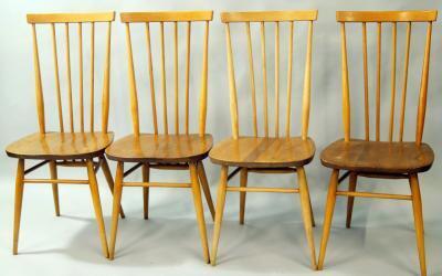 A set of four retro elm finish and lightwood dining chairs