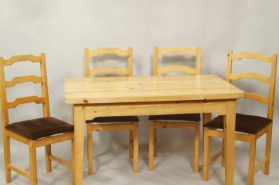 A modern pine finish dining room table and chairs