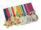 Five WWII medals and ribbons