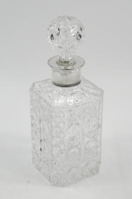 A mid-20thC cut glass decanter and stopper