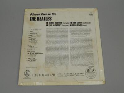 A copy of the Beatles album Please Please Me - 7