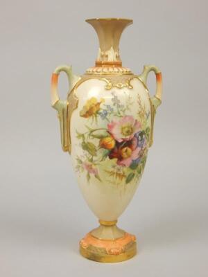 A Royal Worcester porcelain two handled blush ivory ground vase