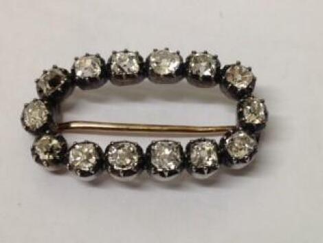 An early 20thC diamond oval brooch