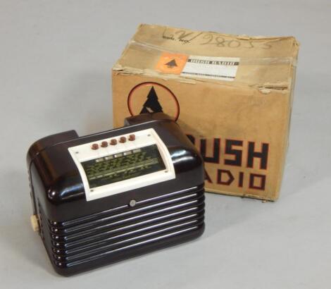 A 1950s Bush brown and cream Bakelite radio