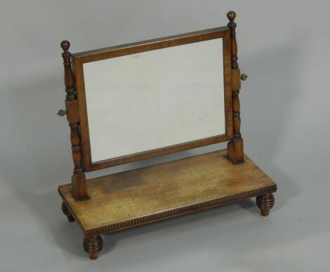 A William IV mahogany swing framed dressing table mirror