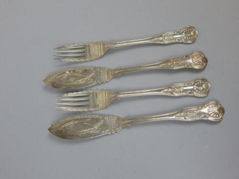 A pair of George V silver fish knives and forks