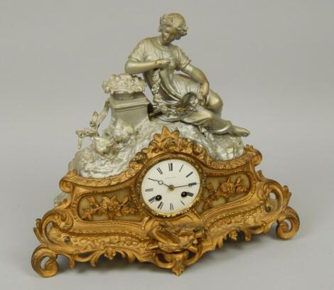 A late 19thC French gilt metal figural mantel clock