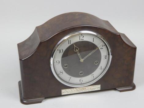 A 1930's Art Deco style brown Bakelite mantel clock