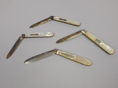 Four Victorian and later mother of pearl and silver plated fruit knives