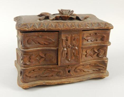 A late 19thC/early 20thC linden wood Black Forest jewellery box