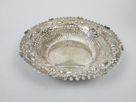 A Victorian pierced and embossed silver circular bon bon dish