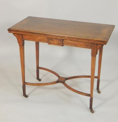 A late Victorian rosewood and marquetry card table