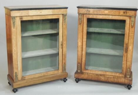 A near pair of Victorian walnut ebonised and marquetry pier cabinets