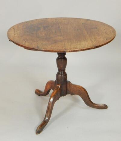 An early 19thC oak occasional table