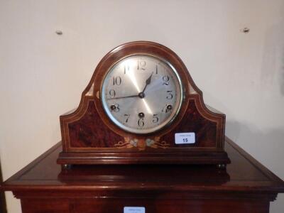 An Edwardian mahogany mantel clock