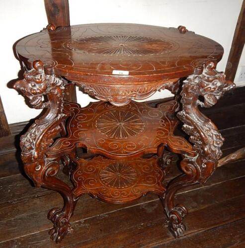 A mid 19thC carved walnut etagere