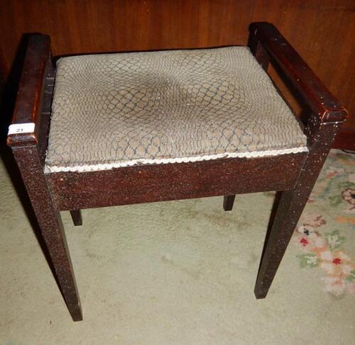 A 1920s mahogany piano stool.