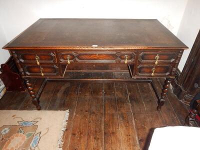 A Jacobean style oak writing table