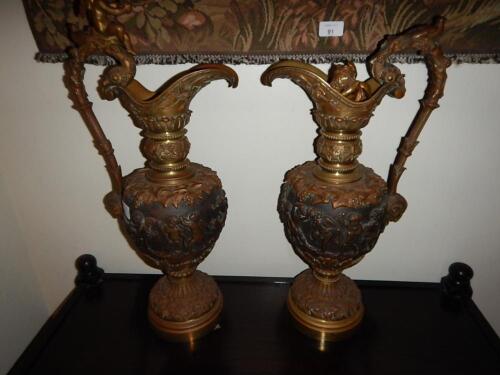 A pair of mid 19thC gilt brass and cast bronze ewers