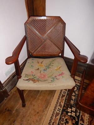 A 1930's mahogany framed open armed occasional chair