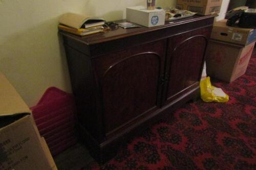 A Victorian figured mahogany sideboard