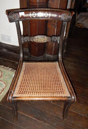 A Regency brass inlaid bar back chair