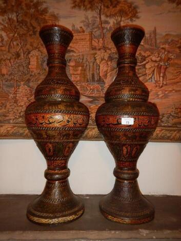 A pair of 20thC Indian embossed and pierced baluster vases