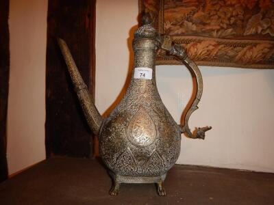 A 19thC Middle Eastern brass coffee pot