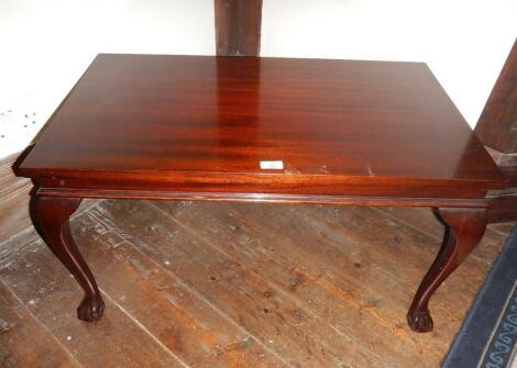 A reproduction mahogany rectangular coffee table