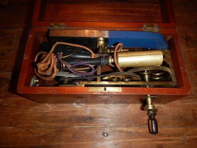 A late Victorian mahogany cased hand operated electric shock generator.