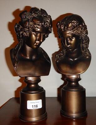 A pair of modern bronze finished classical busts