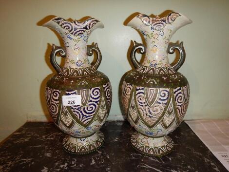 A pair of early 20thC Japanese two handled baluster vases