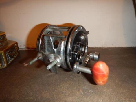 A Penn Senator multiplier fishing reel.