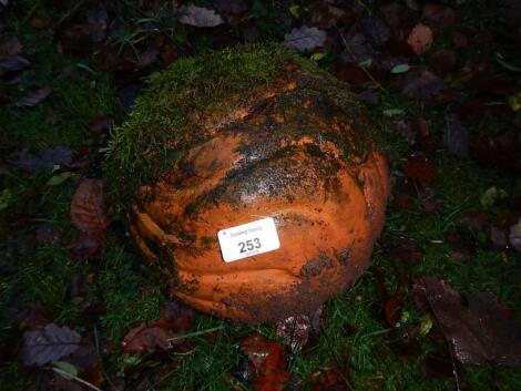 A terracotta whorl fluted spherical ball ornament.