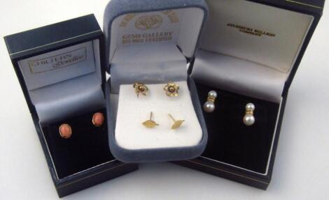 Various earrings and ear studs