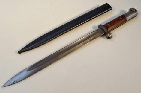 An early 20thC bayonet with metal scabbard