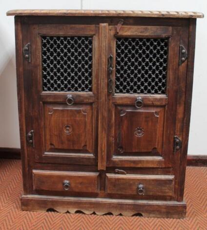 A 20thC JIG style oriental design hardwood cabinet