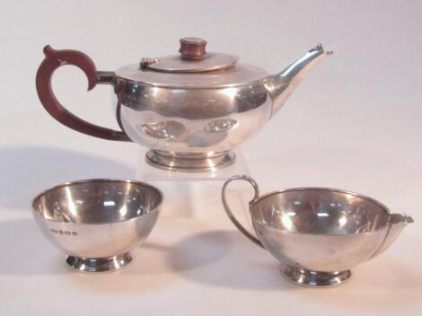 A George VI Harlequin Art Deco silver three piece tea service