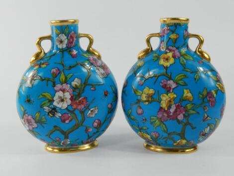 A pair of Coalport aesthetic style porcelain moon flasks