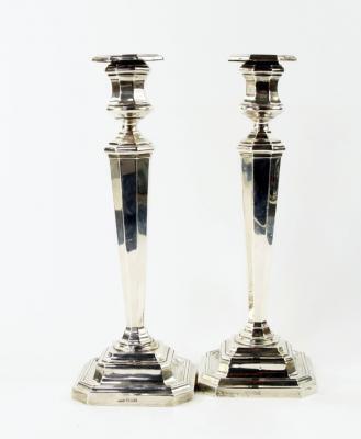 A pair of Edwardian silver candlesticks