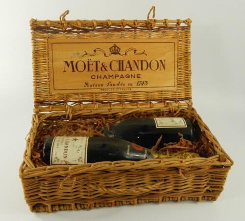 Two bottles of Moet and Chandon Champagne