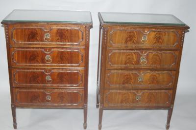 A near pair of mahogany bedside chests