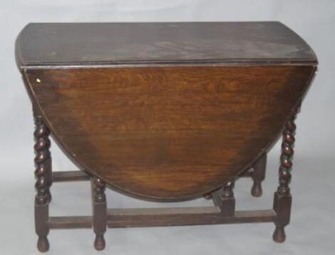 A 19th century oak gateleg dining table