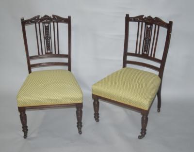 A pair of Edwardian mahogany bedroom chairs