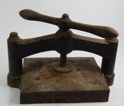 A Victorian cast iron book press