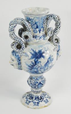 A Veuve Perrin style blue and white tin glazed earthenware vase