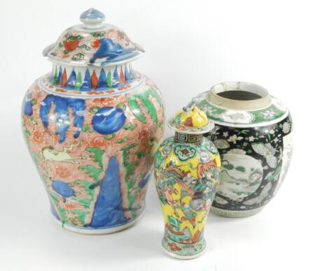 A Kangxi famille noir porcelain ginger jar