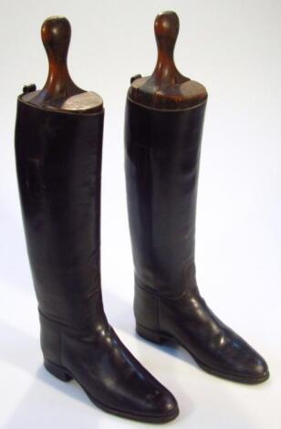 A pair of 20thC black leather riding boots